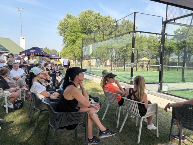 Spectators enjoying a courtside afternoon